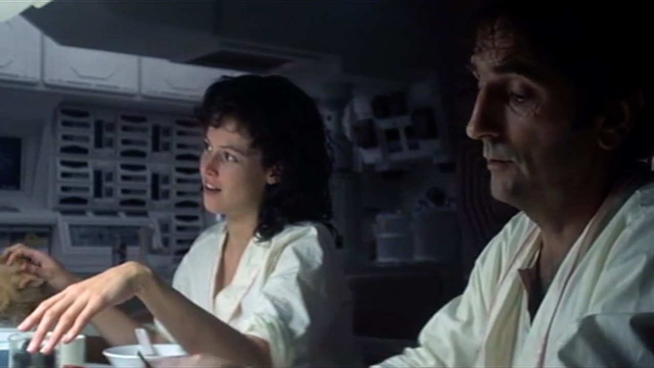 Figure 4: Ripley shows her affection for Jones the cat at the early breakfast scene, becoming the only character to interact with him affectionately (00:07:19).